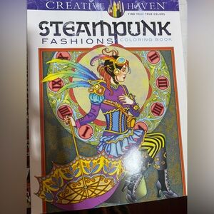 Creative Haven Steampunk Fashions Coloring Book with colored pencils